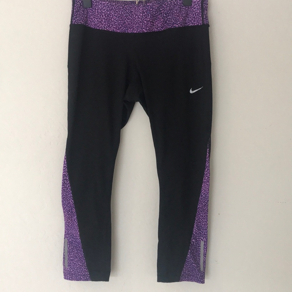Black with purple Nike compression capris